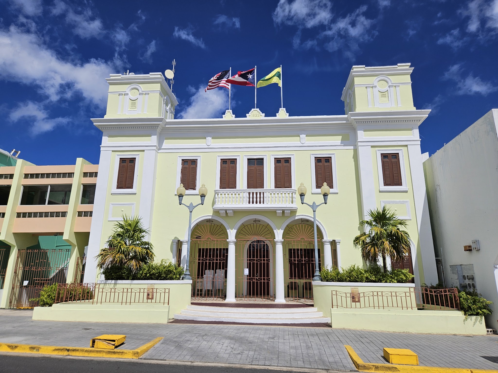 Historic building in Isabela with flags above its entrance