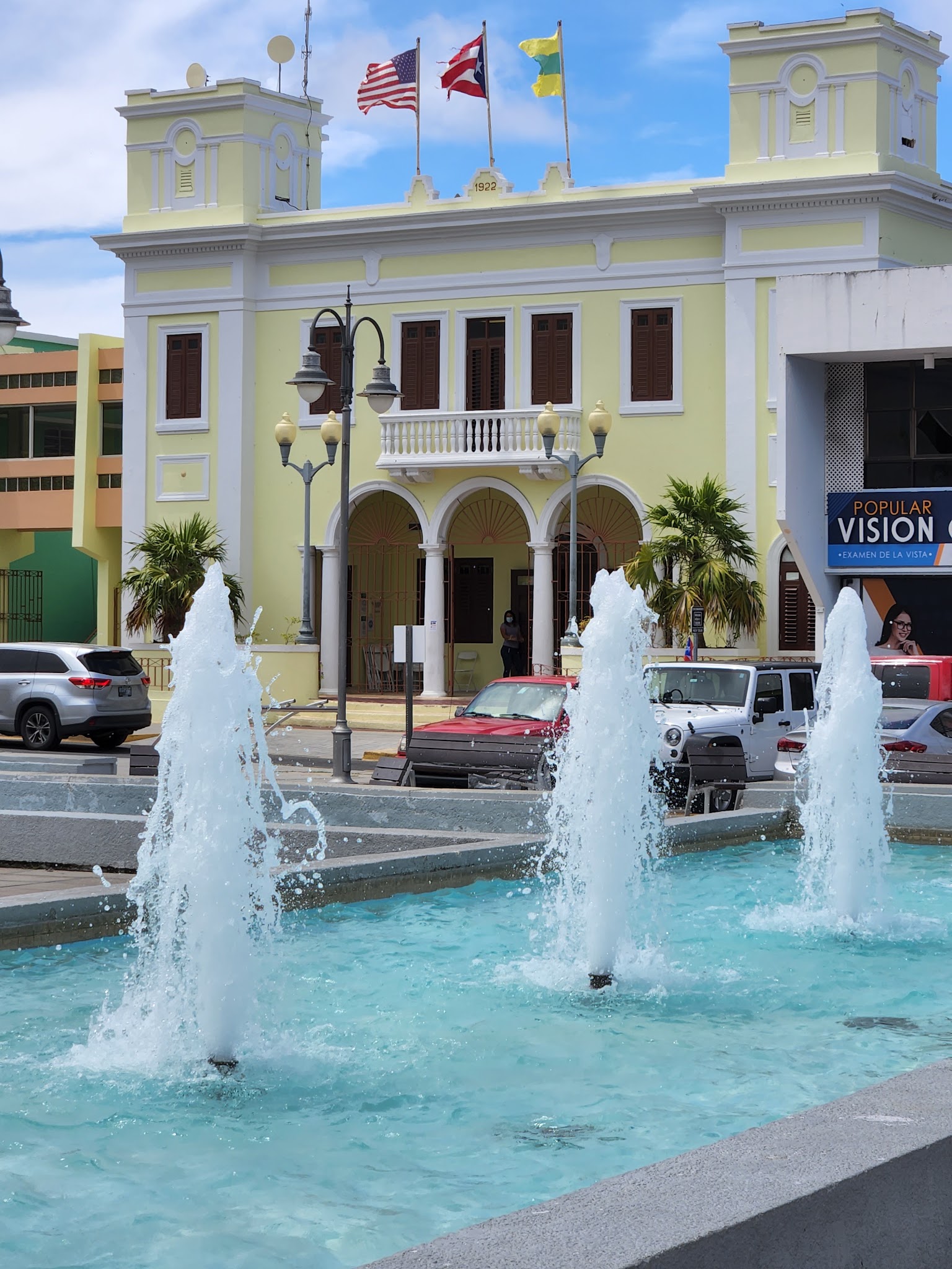 Fountain in front of a historic building at Plaza Manuel María Corchado y Juarbe